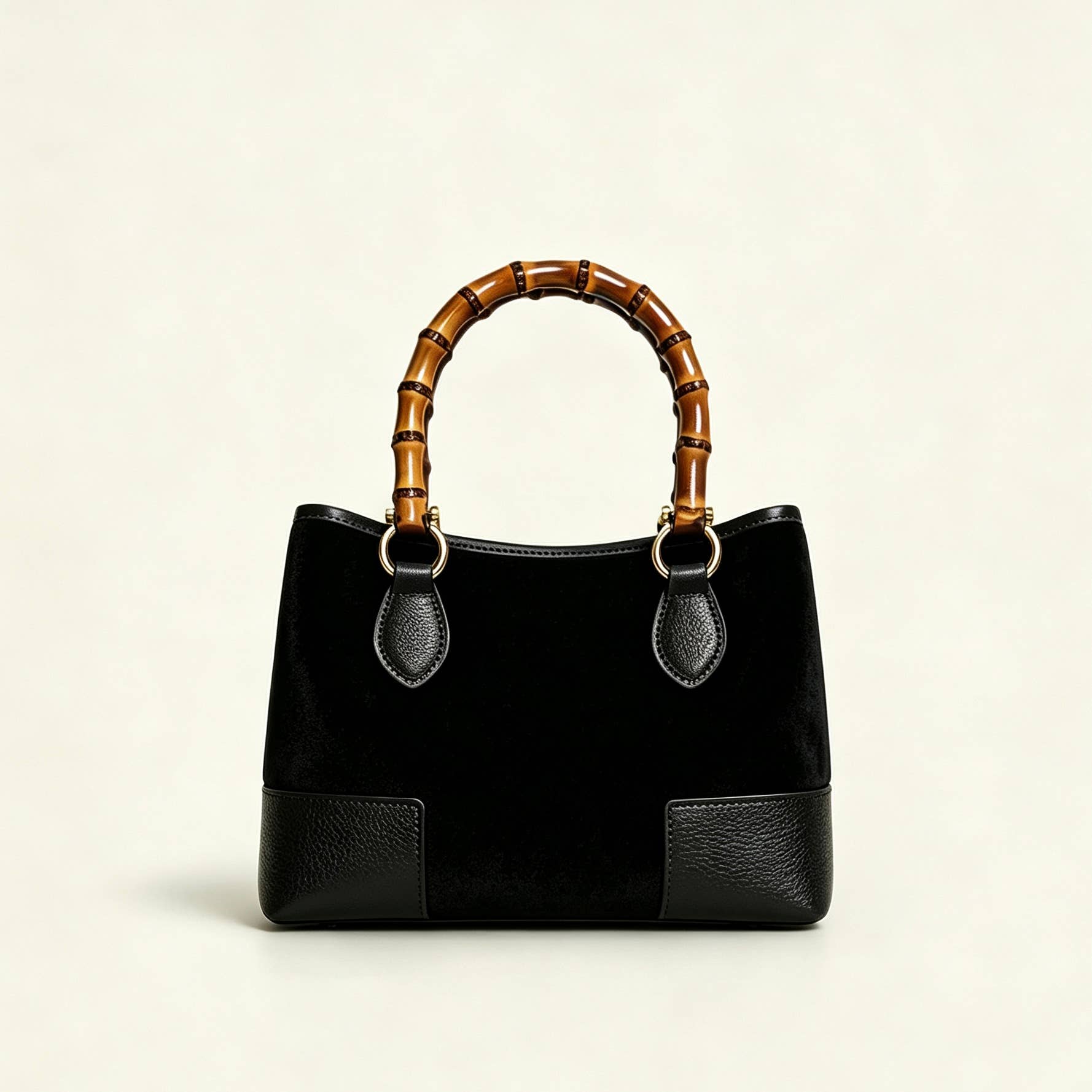 THE C.J. SUEDE BAMBOO TOP HANDLE BAG