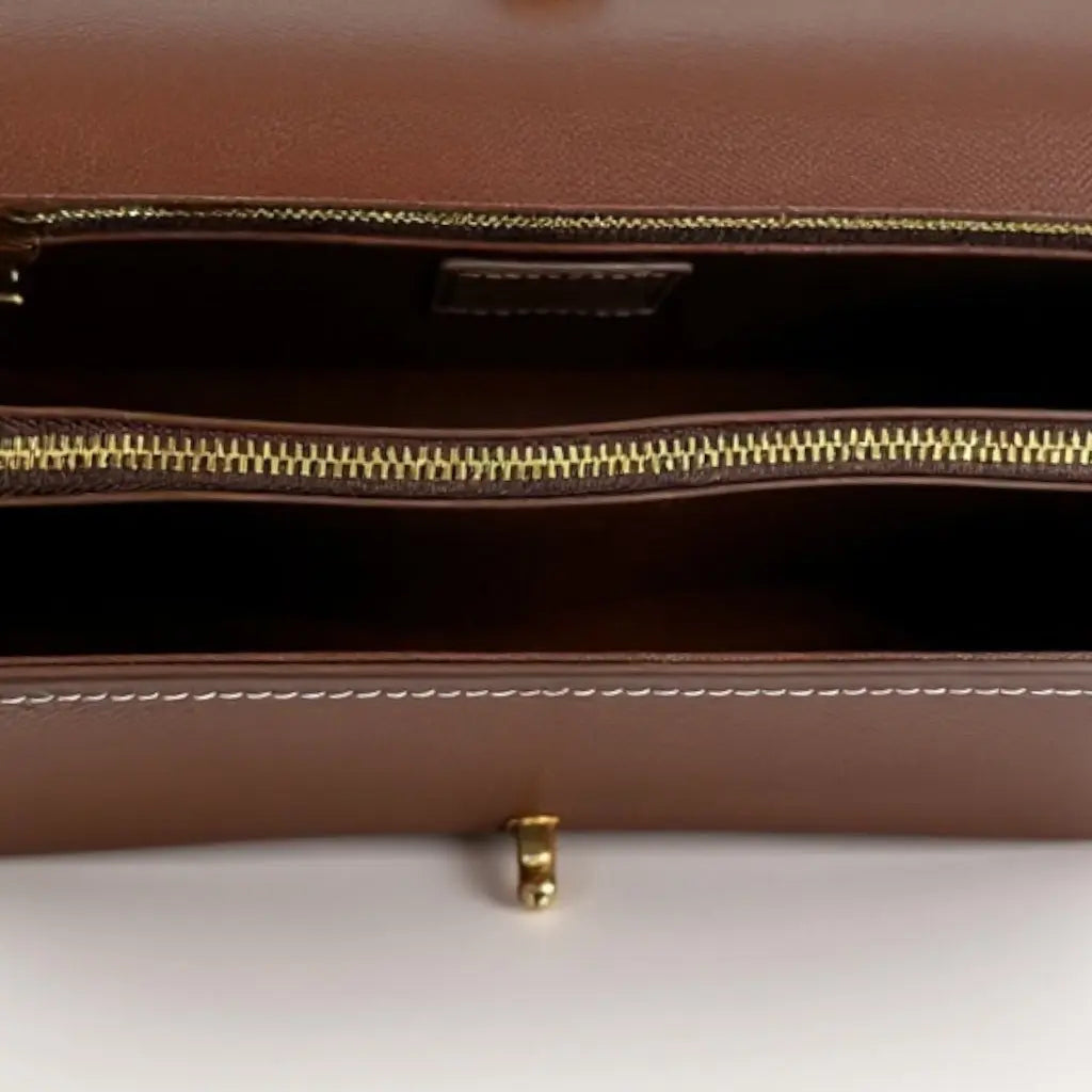 THE DOLL BABY SHOULDER BAG thebagicon